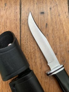 Buck Knife: Buck 1995 Woodsman 102 with Black Phenolic Handle & Leather Sheath