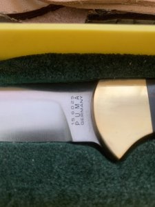 Puma Knife: Puma Original 1992 4 Star Fixed Blade Knife with Black Ebony Handle in Original Green and Yellow Box #26291