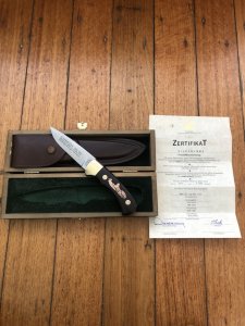 Puma Knife: Puma Rarity Original 1769-1991 4 Star Fixed Blade COPPER Silberlöwe Knife with Grenadill Handle in Original Box