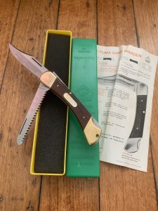 Puma Rare Model 971 Game Warden 1976 Saw and Blade Folding Knife with original box & Paperwork #97674