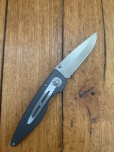Puma Knife: Puma 2002 Handic Linerlock Black & Wood Frame Folding Knife