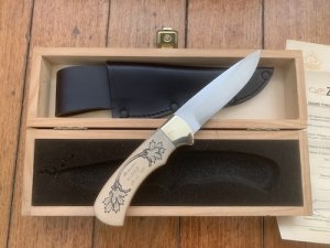 Puma Knife: Puma 1990 American Wildlife Collection 4 star Fixed Blade Knife with White Micarta Handle Original Box and matching Warranty #025/400