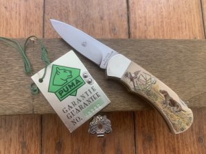 Puma Knife: Puma 1989 Original Scrimshawed Pointer Dog & Pheasant Puma Mini 4 Star Folding Lock Blade Knife with Presentation Box