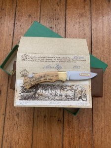 Puma Knife: Puma 1983 Original 4 Star Folding Lock Blade Scrimshawed Roaring Red Stag Knife with in Presentation Box #71/300