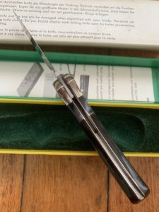 Puma Knife: Puma Original 1977 Full Size 4 Star 725 Folding Lock Blade Knife with Ebony Micarta Handle in Original Box #29771