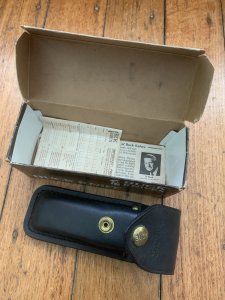 Buck Knife: Buck 1988 Model 110 Hunter Folding Lock Knife with Leather Pouch and Original Box