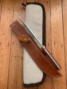 Puma Knife: 1987 Puma Big Big Bowie knife with Wooden Handle in original Tan Leather Sheath & Case
