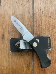 Puma Knife: 2004 Puma 4 Star Mini Folding Lock Knife with Black Buffalo Horn Handle