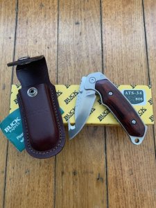 Buck Knife: 2008 Buck Gut Hook Alpha Hunter Folding Knife with Rosewood Laminated Handle & Pouch