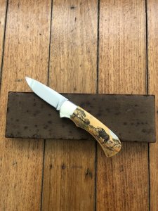 Puma Knife: Puma 1987 Original Scrimshawed 4 Star Folding Lock Blade Knife with Cape buffalo in Presentation Box