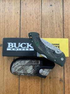 Buck Knife: 2007 Model 397 Large Buck OMNI Hunter Folding Knife with Camo Handle & Pouch