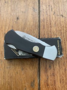Puma Knife: 2004 Puma 4 Star Mini Folding Lock Knife with Black Buffalo Horn Handle