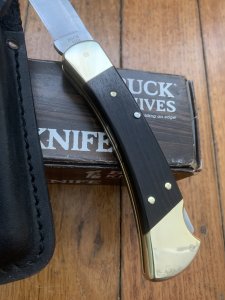 Buck Knife: Buck 1988 Model 110 Hunter Folding Lock Knife with Leather Pouch and Original Box