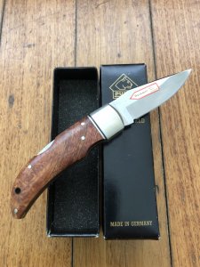 Puma Knife: Rare Puma THUYA Folding Knife with Root Wood Handle in original Black Box