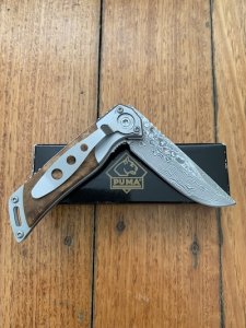 Puma Knife: Puma Tec Damascus Folding Liner Lock Knife with Thuya Root Wood Handle