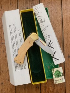 Puma Knife: Puma Original 1982 4 Star Folding Lock Blade Knife with Ivory Micarta Handle in Original Box #16281