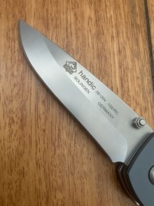 Puma Knife: Puma 2002 Handic Linerlock Black & Wood Frame Folding Knife