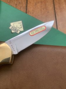 Puma Knife: Puma 1983 Original 4 Star Folding Lock Blade Scrimshawed Roaring Red Stag Knife with in Presentation Box #71/300