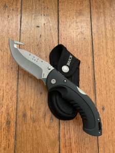 Buck Knife: 2007 Model 398 Large Buck OMNI Hunter Folding Gut Hook Knife with Black Handle & Pouch