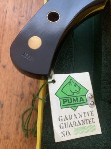 Puma Knife: Puma Original 1992 4 Star Fixed Blade Knife with Black Ebony Handle in Original Green and Yellow Box #26291