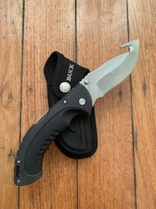 Buck Knife: 2007 Model 398 Large Buck OMNI Hunter Folding Gut Hook Knife with Black Handle & Pouch