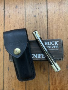 Buck Knife: Buck 1988 Model 110 Hunter Folding Lock Knife with Leather Pouch and Original Box
