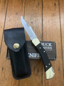 Buck Knife: Buck 1988 Model 110 Hunter Folding Lock Knife with Leather Pouch and Original Box