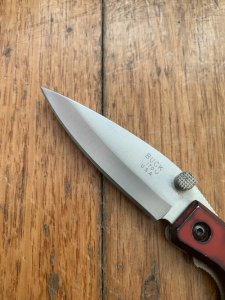 Buck Knife: 2006 Buck 170 Red Lightning Single Blade Pocket Knife With Red Handle