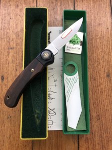 Puma Knife: Puma 1988 model 777 Sport Folding Knife with Walnut Handle Original Box and matching Warranty