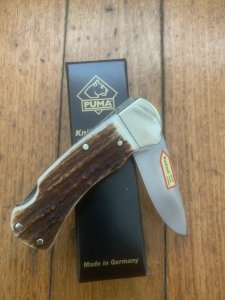 Puma Knife: Puma 2025  Date Stamp 4 Star Full Sized Folding Lock Knife with Stag Antler Handle
