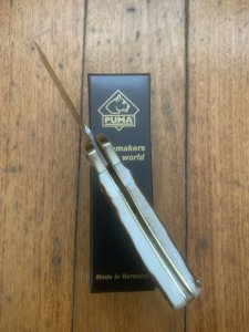 Puma Knife: Puma 2025  Date Stamp 4 Star Full Sized Folding Lock Knife with Stag Antler Handle