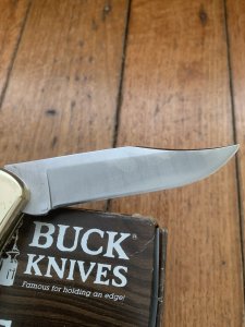 Buck Knife: Buck 1988 Model 110 Hunter Folding Lock Knife with Leather Pouch and Original Box