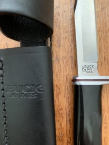 Buck Knife: Buck 2005 Woodsman 102 with Black Phenolic Handle & Leather Sheath