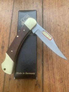 Puma Knife: 2018 Puma Deer Hunter Full Sized Folding Lock Knife with Plumwood Handle