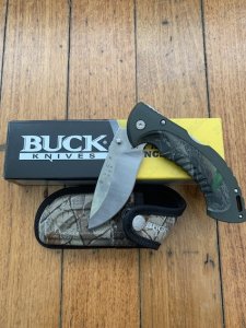 Buck Knife: 2007 Model 398 Large Buck OMNI Hunter Folding Gut Hook Knife with Black Handle & Pouch