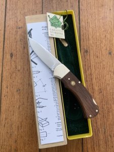 Puma Knife: Puma Original 1981 #26182 Full Size 4 Star 705 Folding Lock Blade Knife with Jacaranda Handle in Original Box & Warranty