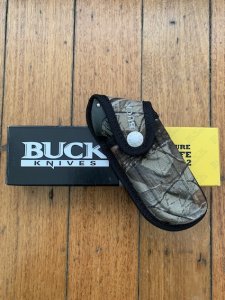 Buck Knife: 2007 Model 397 Large Buck OMNI Hunter Folding Knife with Camo Handle & Pouch