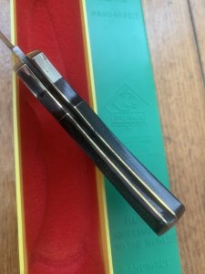 Puma Knife: Puma Original 1979 4 Star Folding Lock Blade Knife with Black Ebony Micarta Handle in Original Box #13971