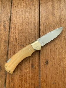 Puma Knife: Puma Original 1985 4 Star Folding Lock Blade Knife with Orange Ivory Micarta Handle