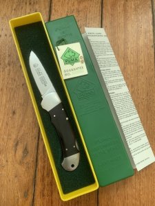 Puma 1989 model 985 Custom Folding Knife with Ebony Handle Original Box and matching Warranty #23981
