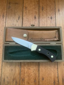 Puma Knife: Puma Original 1980's-90's 4 Star Fixed Blade Knife with Black Micarta Handle-Tan Sheath in Original Wooden Box