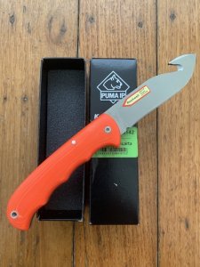 Puma Knife: Puma IP Pathfinder with gut hook, Orange Micarta Handle