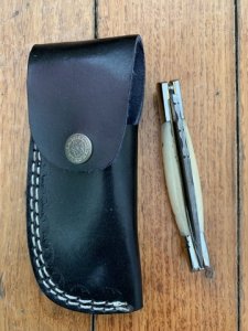 Damascus Folding Knife with White Bone Handle File Work and Pouch
