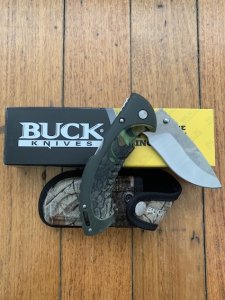 Buck Knife: 2007 Model 397 Large Buck OMNI Hunter Folding Knife with Camo Handle & Pouch