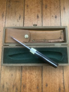 Puma Knife: Puma Original 1980's-90's 4 Star Fixed Blade Knife with Black Micarta Handle-Tan Sheath in Original Wooden Box
