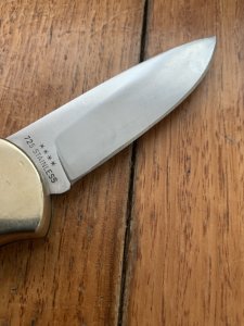 Puma Knife: Puma Original 1977 4 Star Folding Lock Blade Knife with Black Ebony Micarta Handle #29771