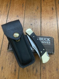 Buck Knife: Buck 1988 Model 110 Hunter Folding Lock Knife with Leather Pouch and Original Box