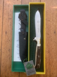 Puma Knife: Puma 1987 Jagdnicker Knife with Stag Handle & Green & Yellow Box
