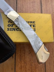 Buck Knife: 2007 Model Buck 110 Classic with Pearl Cordon Handle and Leather Pouch