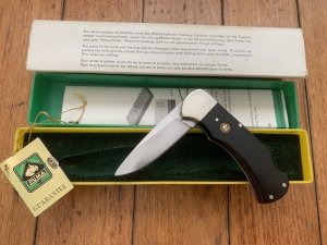 Puma Knife: Puma Original 1977 Full Size 4 Star 725 Folding Lock Blade Knife with Ebony Micarta Handle in Original Box #29771